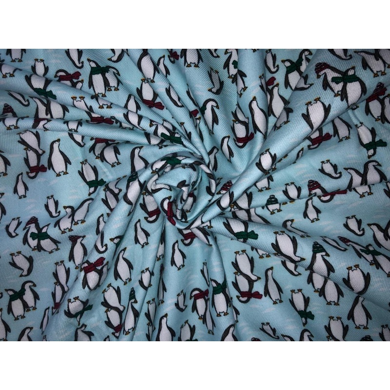 100% Cotton flannel Print 58"wide available in 3 prints penguin, snowmen and skiing on ice