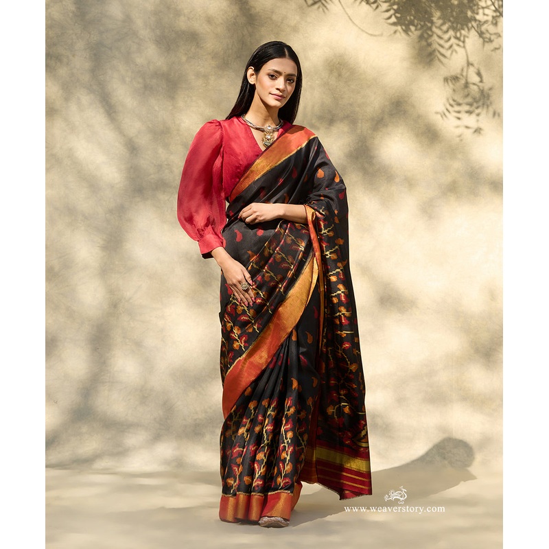 Black Handloom Pure Mulberry Silk Ikat Patola Saree With Big Peacock Motif On Pallu And Gold Zari Border