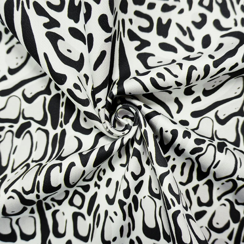 Black-Multi 11.5 oz. Leopard Printed Cotton Blend Denim Fabric