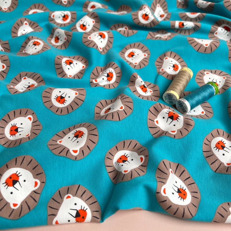 REMNANT 0.47 Metre (with pulled stitch) - Cute Lions Turquoise Cotton Jersey Fabric